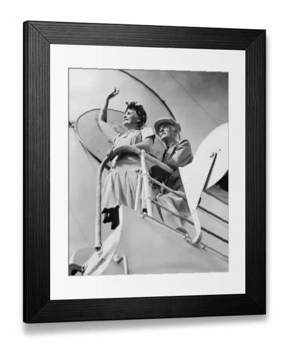 Framed Print : Couple standing at railing on cruiser deck (B&W), (low angle view)