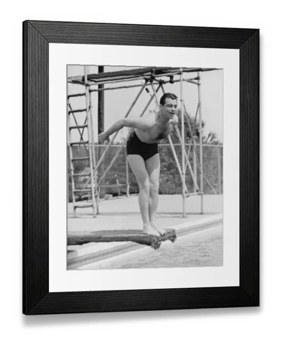Framed Print : Man standing on diving board, preparing to dive (B&W) Framed Print : Man standing on diving board, preparing to dive (B&W)