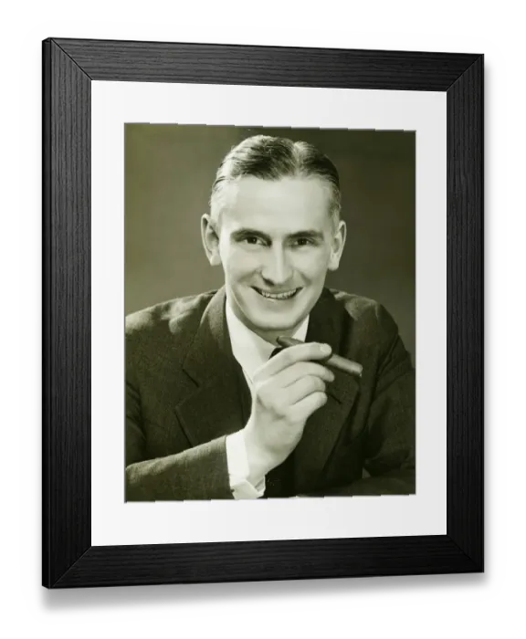 Framed Print : Businessman holding cigar, (B&W), portrait Framed Print : Businessman holding cigar, (B&W), portrait