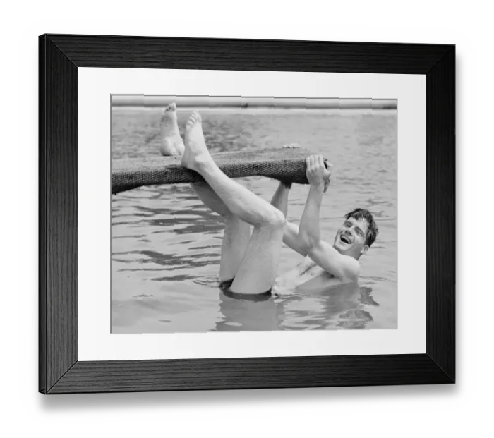 Framed Print : Man hanging from diving board (B&W) Framed Print : Man hanging from diving board (B&W)