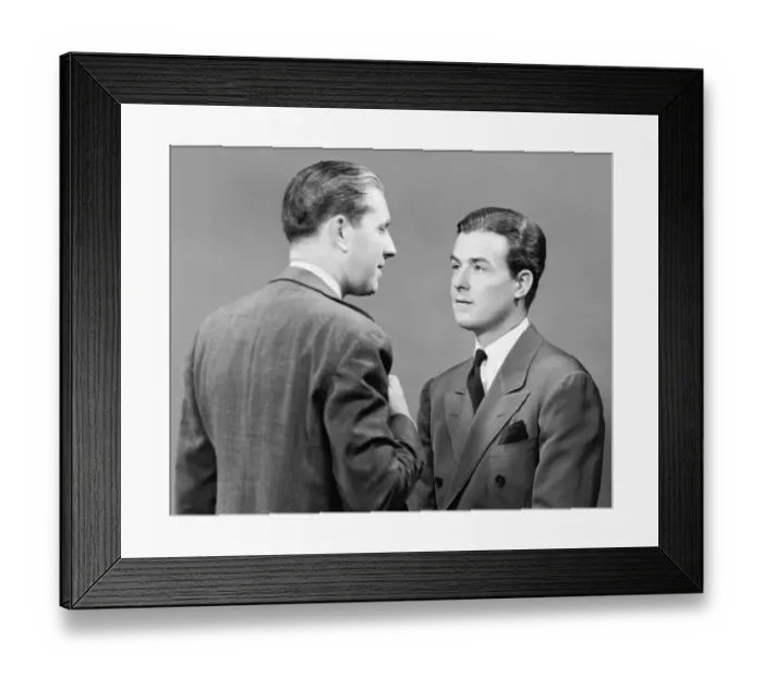 Framed Print : Two businessmen discussing in studio (B&W)