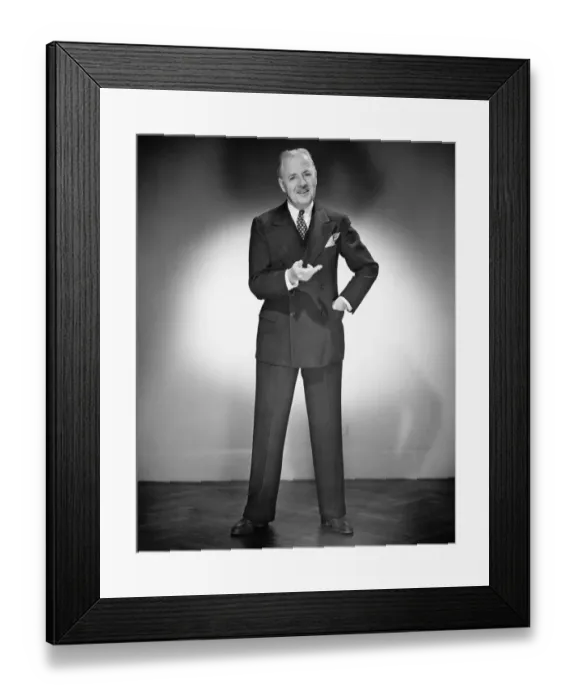 Framed Print : Mature man in full suit posing in studio, (B&W), portrait Framed Print : Mature man in full suit posing in studio, (B&W), portrait