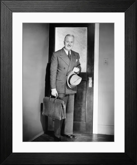 Framed Print : Mature man posing at doors, about living home, (B&W), portrait Framed Print : Mature man posing at doors, about living home, (B&W), portrait