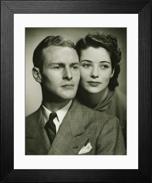 Framed Print : Young couple, formal portrait in studio, (B&W), close-up Framed Print : Young couple, formal portrait in studio, (B&W), close-up