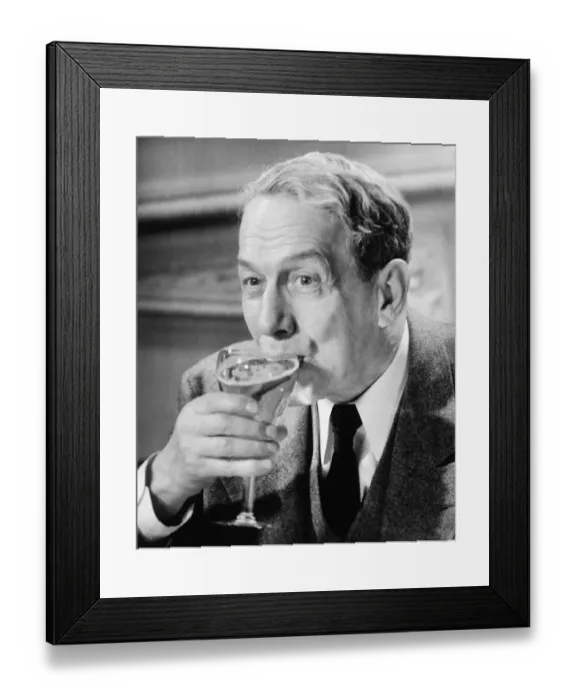 Framed Print : Senior drinking from glass (B&W) Framed Print : Senior drinking from glass (B&W)