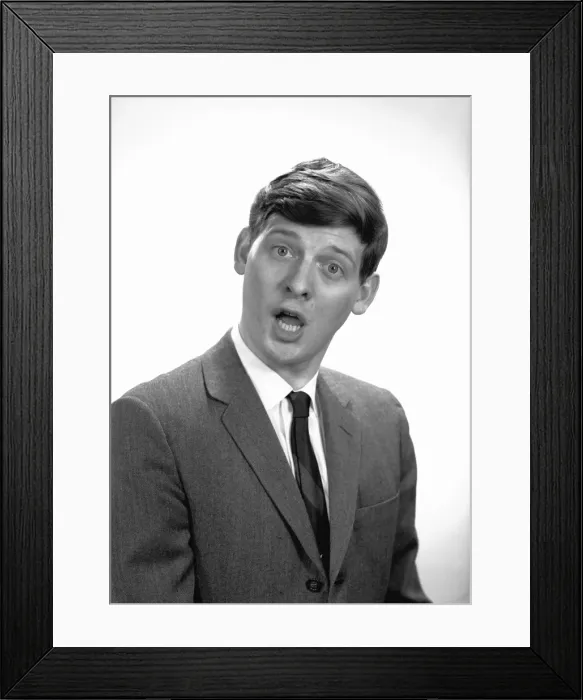 Framed Print : Man making face in studio, (B&W), portrait Framed Print : Man making face in studio, (B&W), portrait