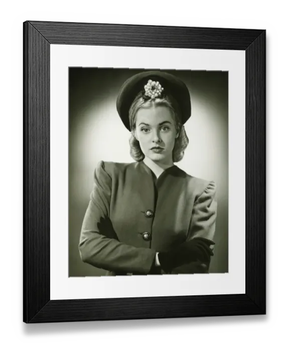 Framed Print : Young woman in fashionable suit and hat in studio, (B&W), portrait