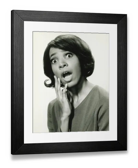 Framed Print : Young woman with surprised expression, (B&W), close-up Framed Print : Young woman with surprised expression, (B&W), close-up