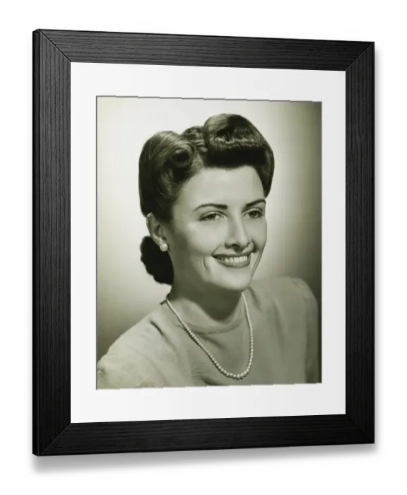 Framed Print : Woman smiling in studio, (B&W), close-up Framed Print : Woman smiling in studio, (B&W), close-up