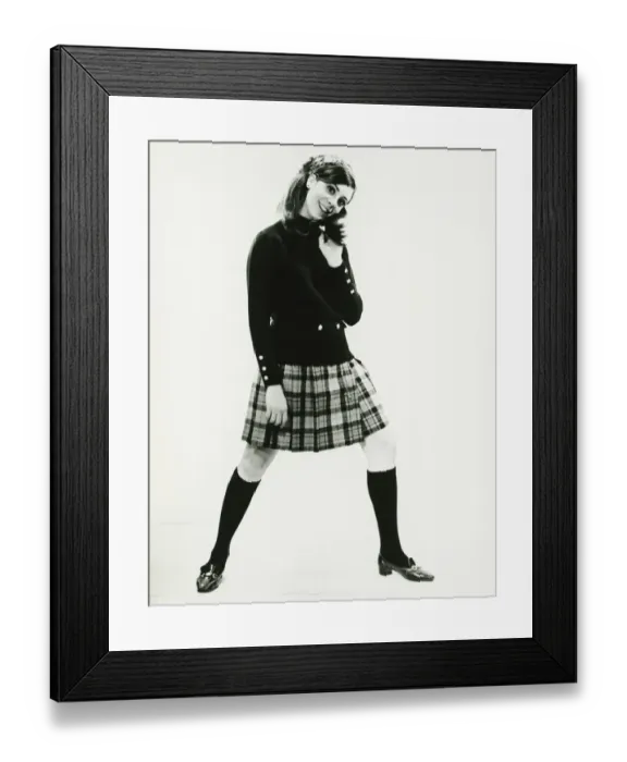 Framed Print : Woman in kilt posing in studio, (B&W), portrait Framed Print : Woman in kilt posing in studio, (B&W), portrait