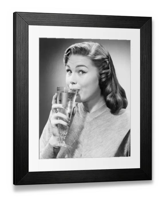 Framed Print : Woman drinking water is studio, (B&W) Framed Print : Woman drinking water is studio, (B&W)