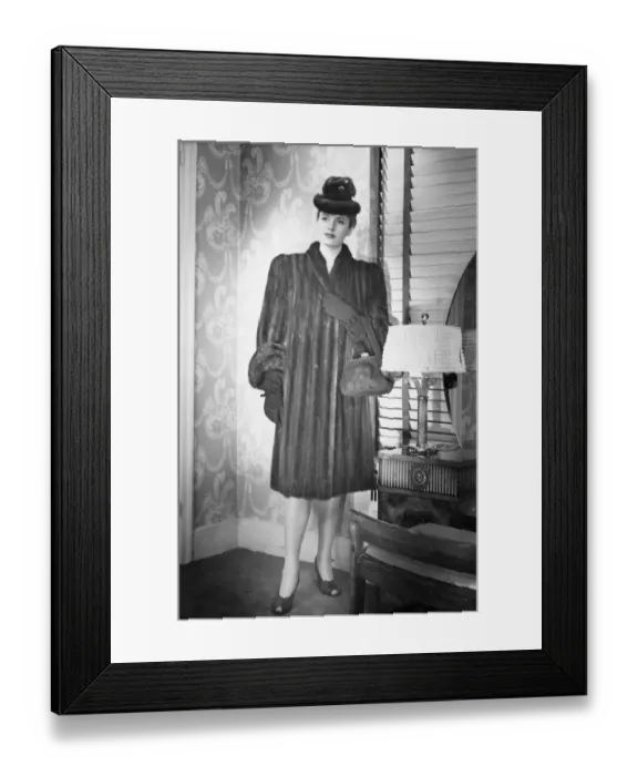Framed Print : Fashionable woman in mink coat and hat standing in anteroom, (B&W), portrait Framed Print : Fashionable woman in mink coat and hat standing in anteroom, (B&W), portrait