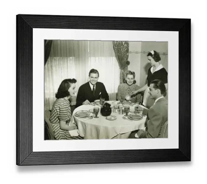 Framed Print : Two couples having dinner, maid pouring soup, (B&W) Framed Print : Two couples having dinner, maid pouring soup, (B&W)