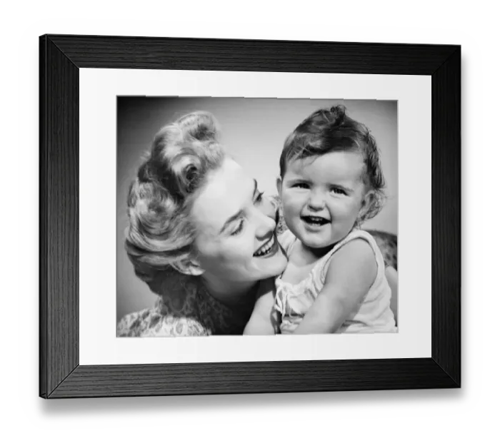 Framed Print : Mother smiling to baby girl (12-18 months), (B&W), close-up