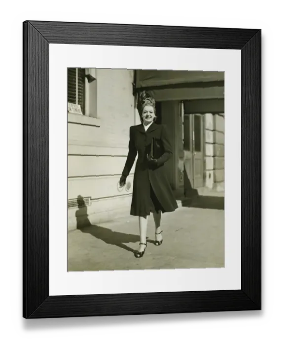 Framed Print : Elegant woman walking on sidewalk, (B&W) Framed Print : Elegant woman walking on sidewalk, (B&W)