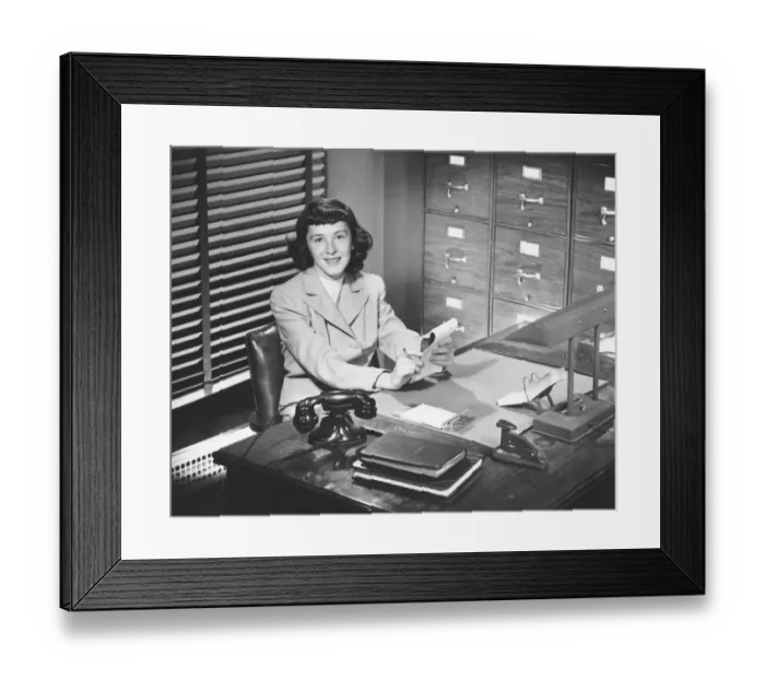 Framed Print : Secretary working in office, (B&W) Framed Print : Secretary working in office, (B&W)
