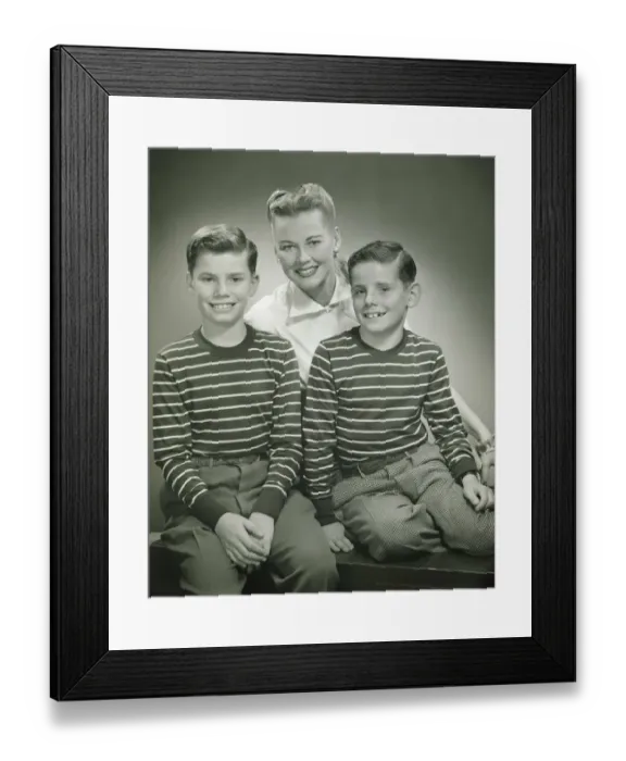Framed Print : Mother with brothers (8-9) (10-11) sitting in studio, smiling, (B&W), portrait Framed Print : Mother with brothers (8-9) (10-11) sitting in studio, smiling, (B&W), portrait