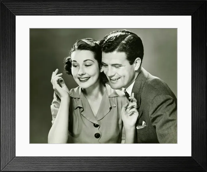 Framed Print : Couple posing in studio, (B&W), portrait Framed Print : Couple posing in studio, (B&W), portrait