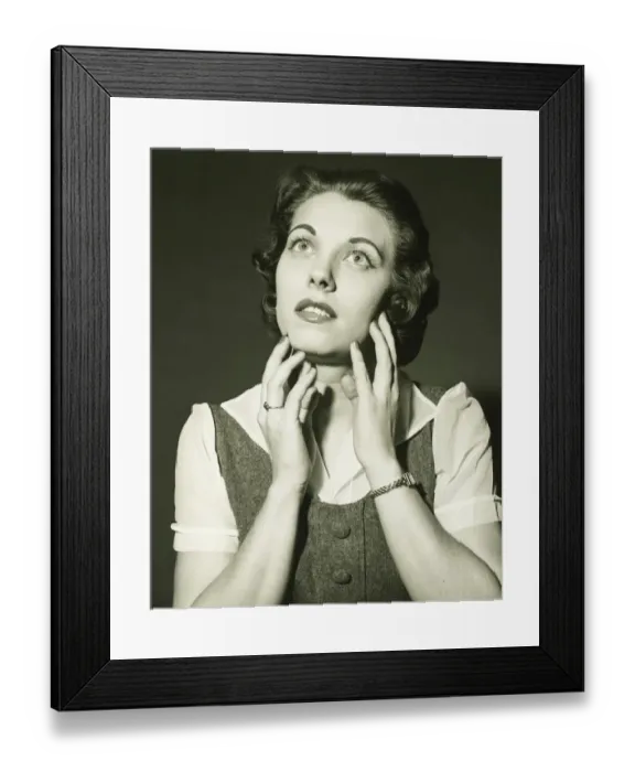 Framed Print : Woman looking up in studio, (B&W), portrait Framed Print : Woman looking up in studio, (B&W), portrait