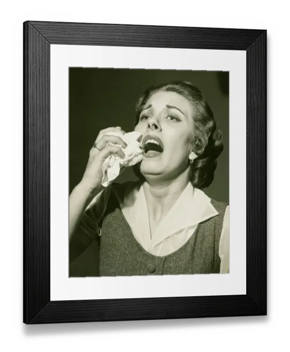 Framed Print : Woman holding handkerchief about to sneeze, (B&W), close-up Framed Print : Woman holding handkerchief about to sneeze, (B&W), close-up