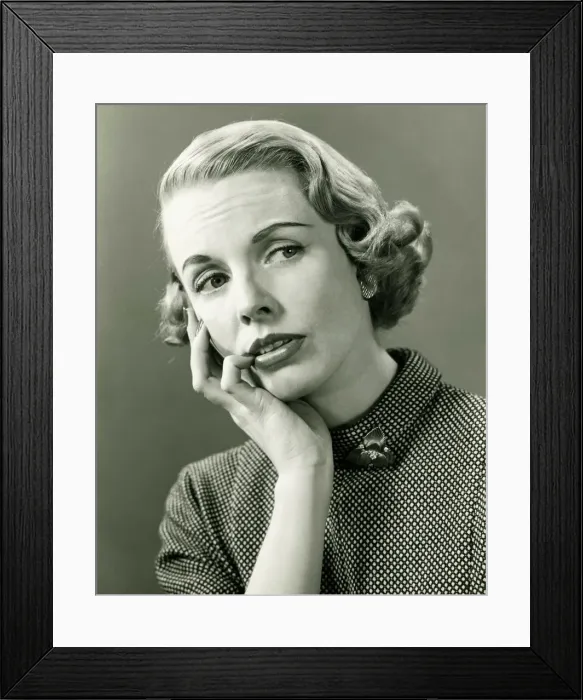 Framed Print : Thoughtful woman posing in studio, (B&W), portrait Framed Print : Thoughtful woman posing in studio, (B&W), portrait