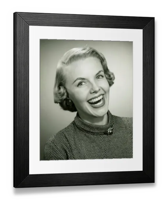 Framed Print : Laughing woman posing in studio, (B&W), portrait, close-up Framed Print : Laughing woman posing in studio, (B&W), portrait, close-up
