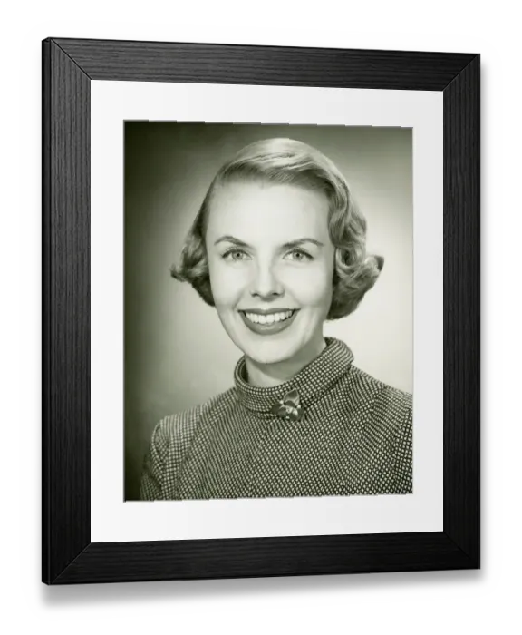 Framed Print : Smiling woman posing in studio, (B&W), portrait, close-up Framed Print : Smiling woman posing in studio, (B&W), portrait, close-up