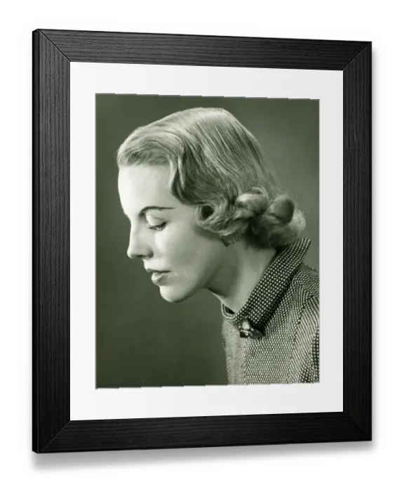 Framed Print : Profile of woman posing in studio, (B&W), portrait Framed Print : Profile of woman posing in studio, (B&W), portrait