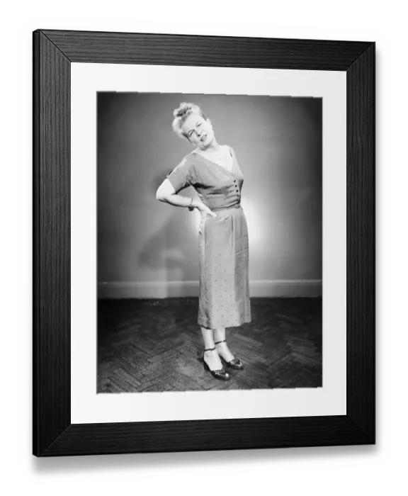 Framed Print : Mature woman suffering backache, (B&W) Framed Print : Mature woman suffering backache, (B&W)