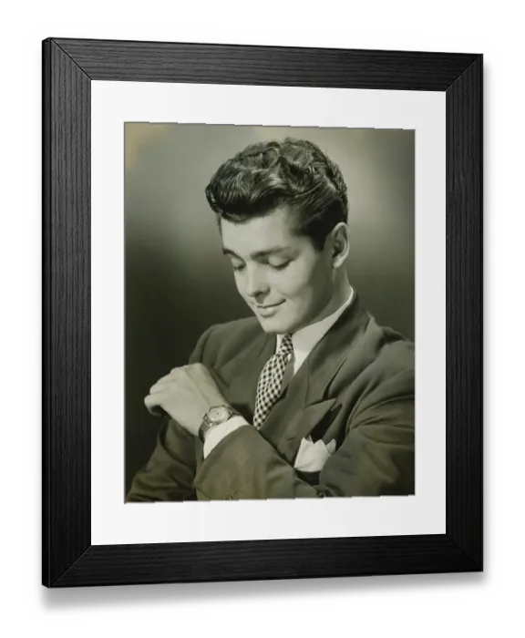 Framed Print : Young businessman checking time on watch, (B&W), close-up Framed Print : Young businessman checking time on watch, (B&W), close-up