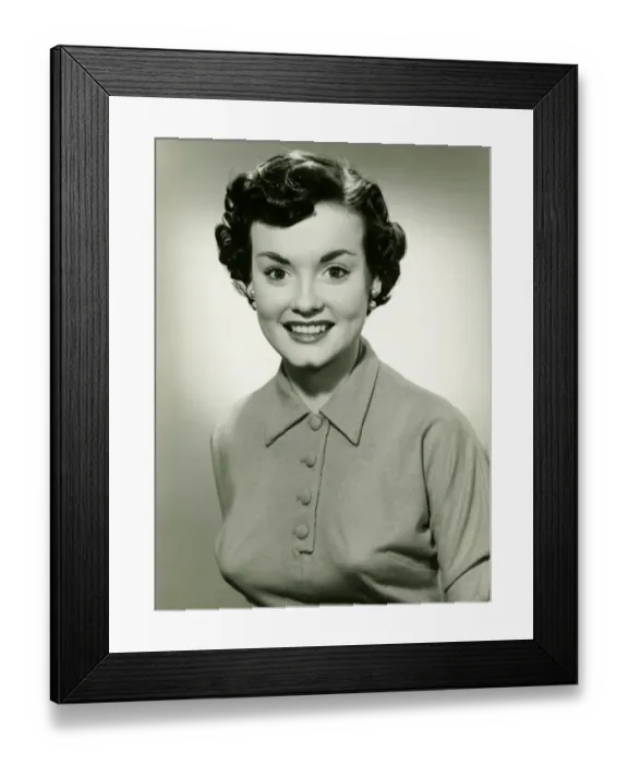 Framed Print : Young woman with short hair smiling, (B&W), portrait Framed Print : Young woman with short hair smiling, (B&W), portrait