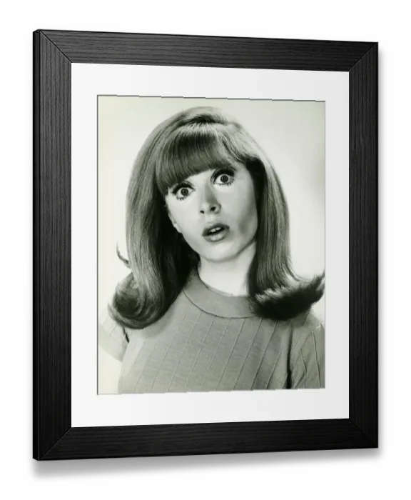 Framed Print : Woman looking surprised, posing in studio, (B&W), portrait Framed Print : Woman looking surprised, posing in studio, (B&W), portrait