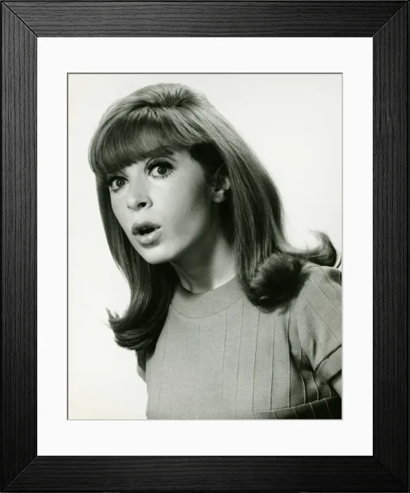 Framed Print : Woman looking surprised, posing in studio, (B&W), portrait Framed Print : Woman looking surprised, posing in studio, (B&W), portrait