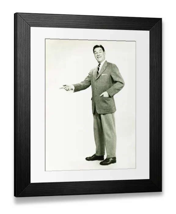 Framed Print : Businessman standing in studio, posing, (B&W) Framed Print : Businessman standing in studio, posing, (B&W)