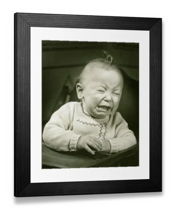 Framed Print : Baby (9-12 months) in baby seat crying, (B&W), close-up Framed Print : Baby (9-12 months) in baby seat crying, (B&W), close-up