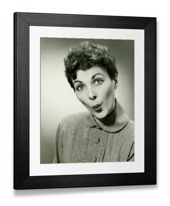 Framed Print : Woman whistling in studio, (B&W), portrait Framed Print : Woman whistling in studio, (B&W), portrait