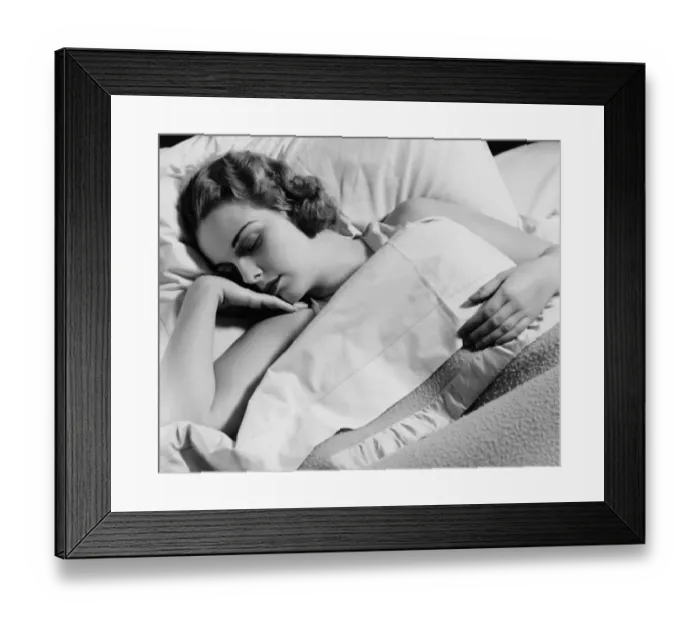 Framed Print : Young woman asleep in bed, (B&W), close-up Framed Print : Young woman asleep in bed, (B&W), close-up