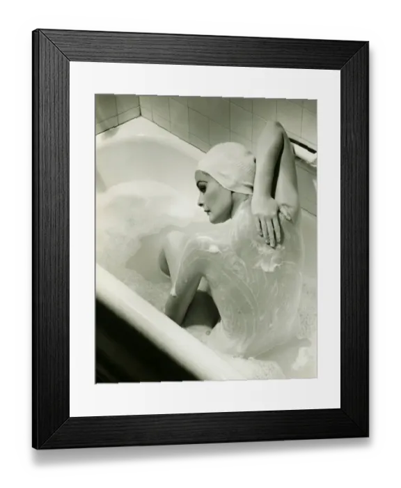 Framed Print : Woman washing herself in bathtub, (B&W), elevated view Framed Print : Woman washing herself in bathtub, (B&W), elevated view