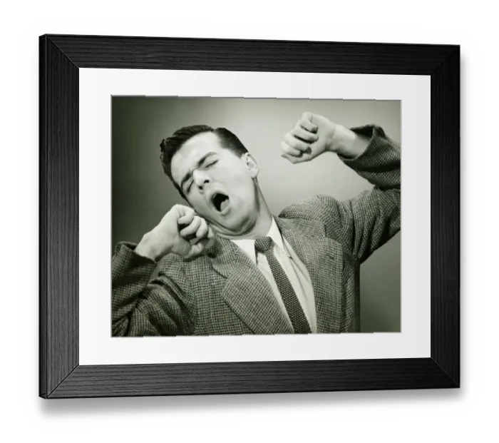 Framed Print : Man yawning and stretching in studio, (B&W) Framed Print : Man yawning and stretching in studio, (B&W)