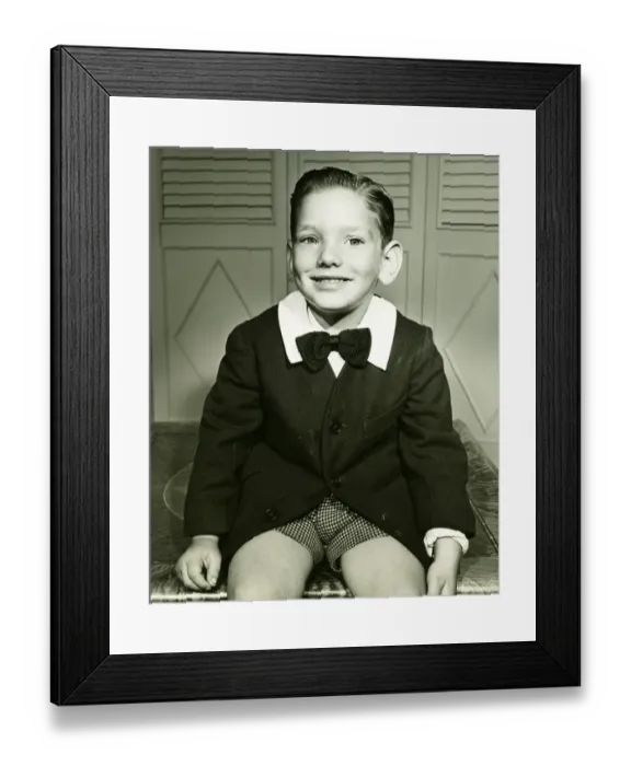 Framed Print : Elegant boy (4-5) posing at home, (B&W), portrait