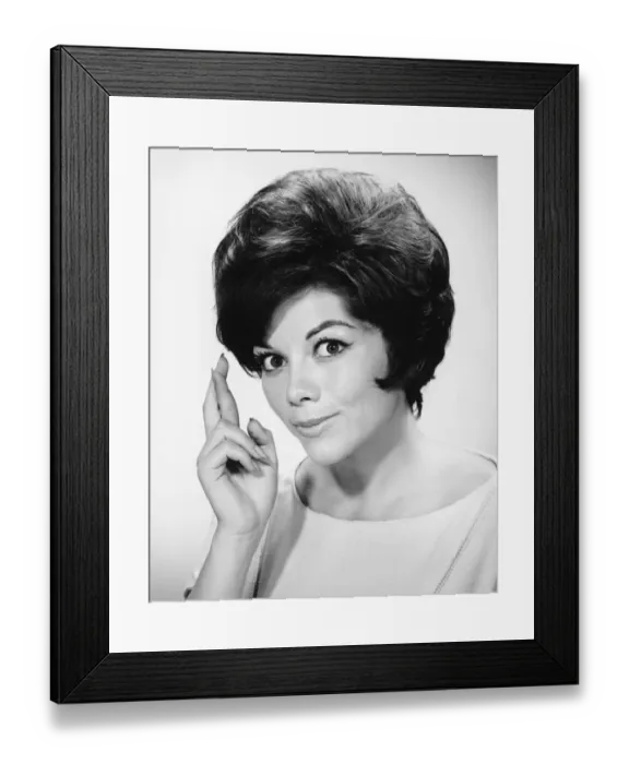 Framed Print : Young woman with fingers crossed, in studio, (B&W), portrait Framed Print : Young woman with fingers crossed, in studio, (B&W), portrait