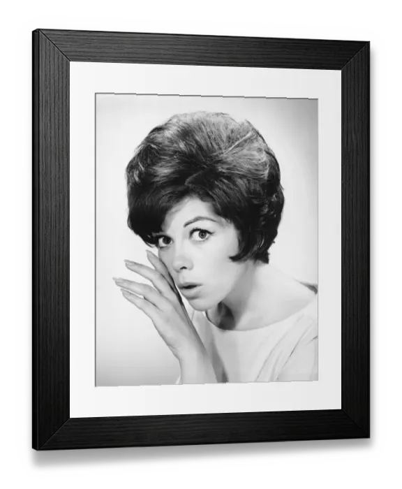 Framed Print : Young woman whispering, in studio, (B&W), portrait Framed Print : Young woman whispering, in studio, (B&W), portrait