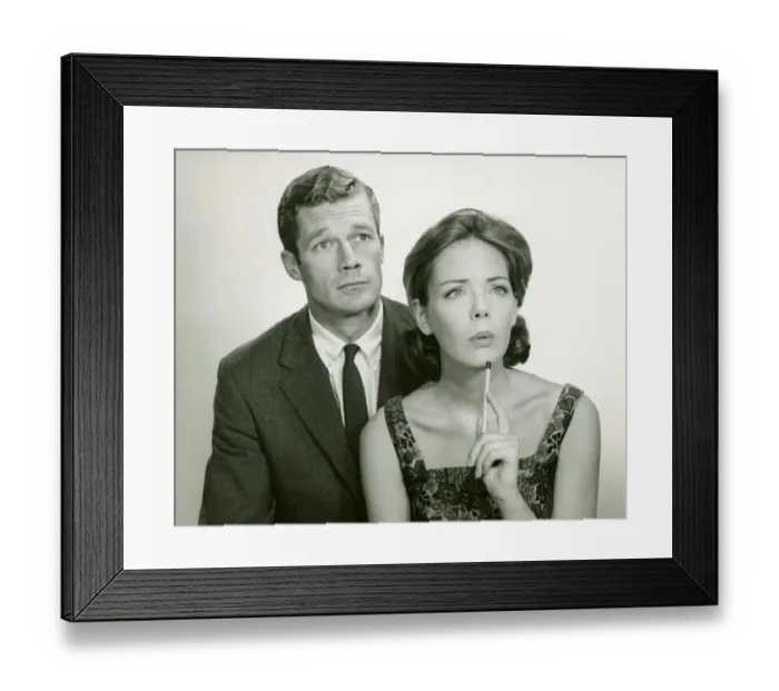 Framed Print : Couple in studio, looking thoughtful, posing (B&W), portrait Framed Print : Couple in studio, looking thoughtful, posing (B&W), portrait