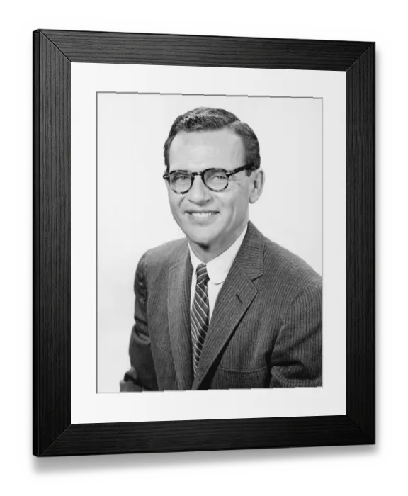 Framed Print : Man posing in studio, (B&W), portrait Framed Print : Man posing in studio, (B&W), portrait