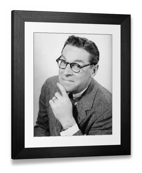 Framed Print : Man posing in studio, (B&W), portrait Framed Print : Man posing in studio, (B&W), portrait