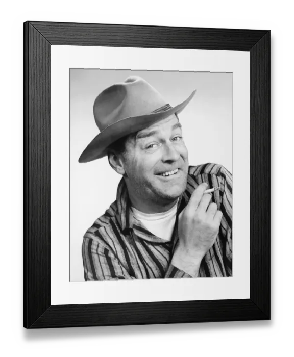 Framed Print : Man in stetson hat posing in studio, smoking cigarette, (B&W), portrait Framed Print : Man in stetson hat posing in studio, smoking cigarette, (B&W), portrait
