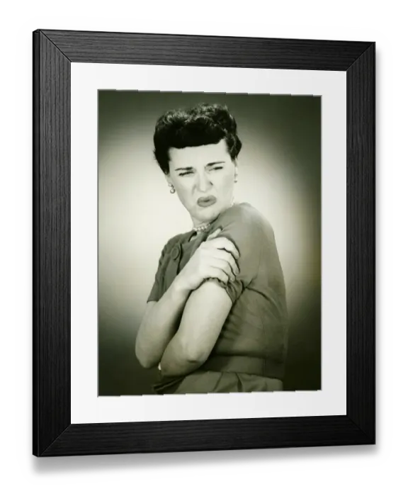 Framed Print : Woman grimacing, arms folded, (B&W), portrait Framed Print : Woman grimacing, arms folded, (B&W), portrait