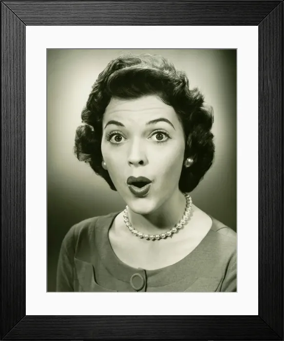 Framed Print : Woman making face in studio, (B&W), close-up, portrait Framed Print : Woman making face in studio, (B&W), close-up, portrait