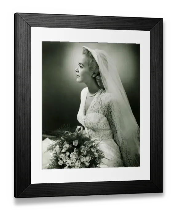 Framed Print : Bride with bouquet posing in studio, (B&W), portrait