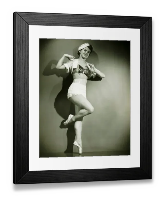Framed Print : Chorus girl dancing in studio, (B&W) Framed Print : Chorus girl dancing in studio, (B&W)